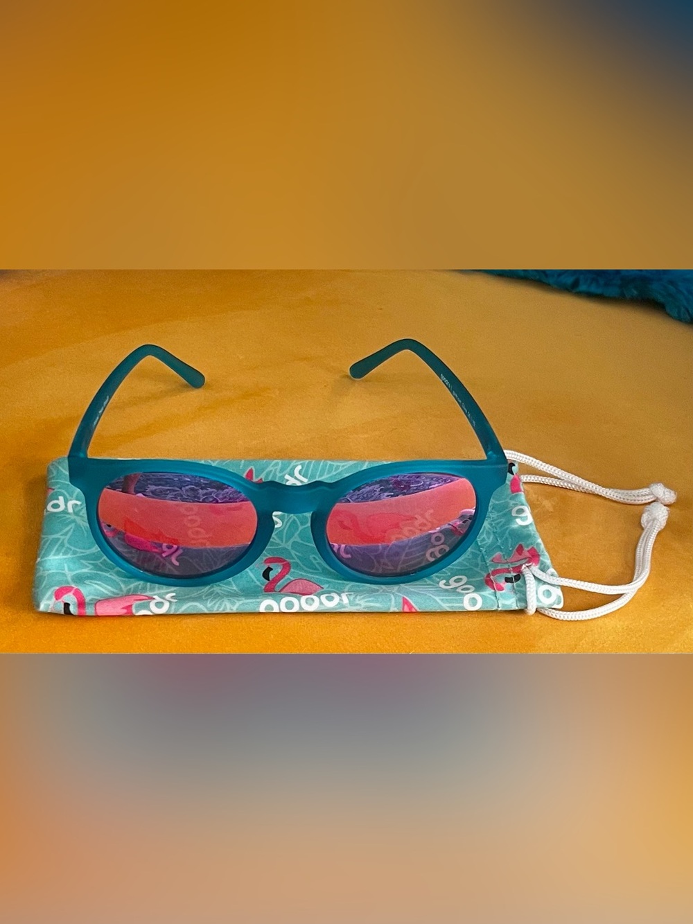 Goodr Teal Frame Sunglasses with Pink Mirrored Polarized Lenses